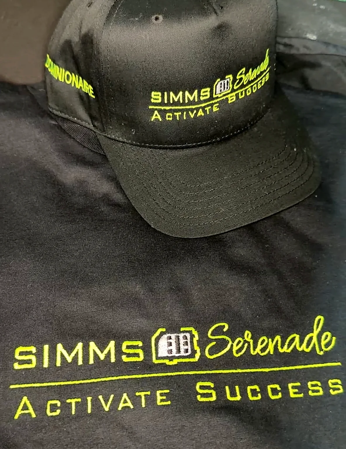 Black embroidered Simms Serenade cap and shirt