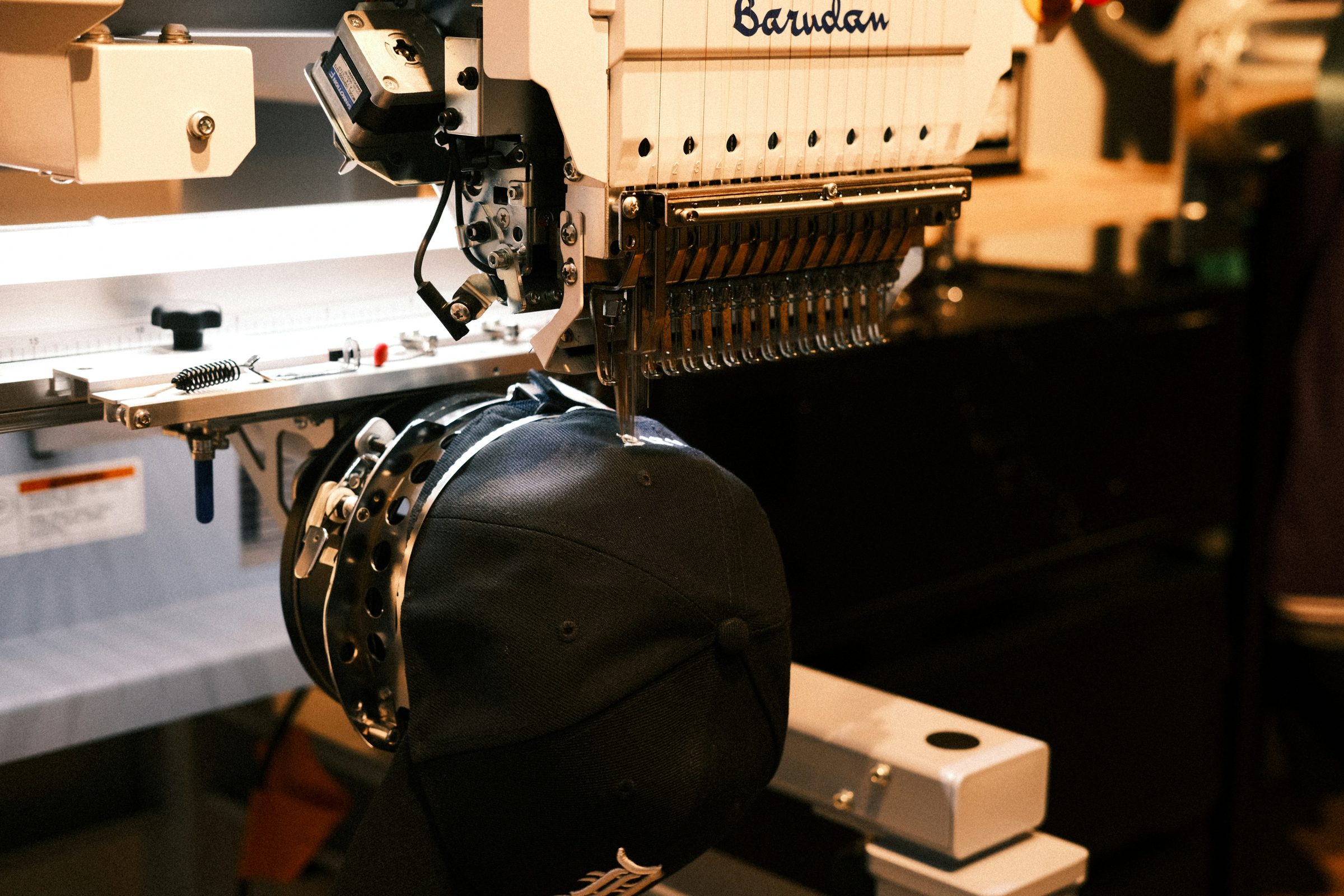 Embroidery production work at Adequate Apparel